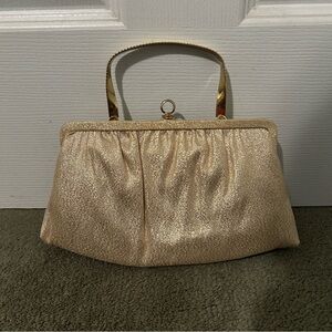 Small gold handbag.